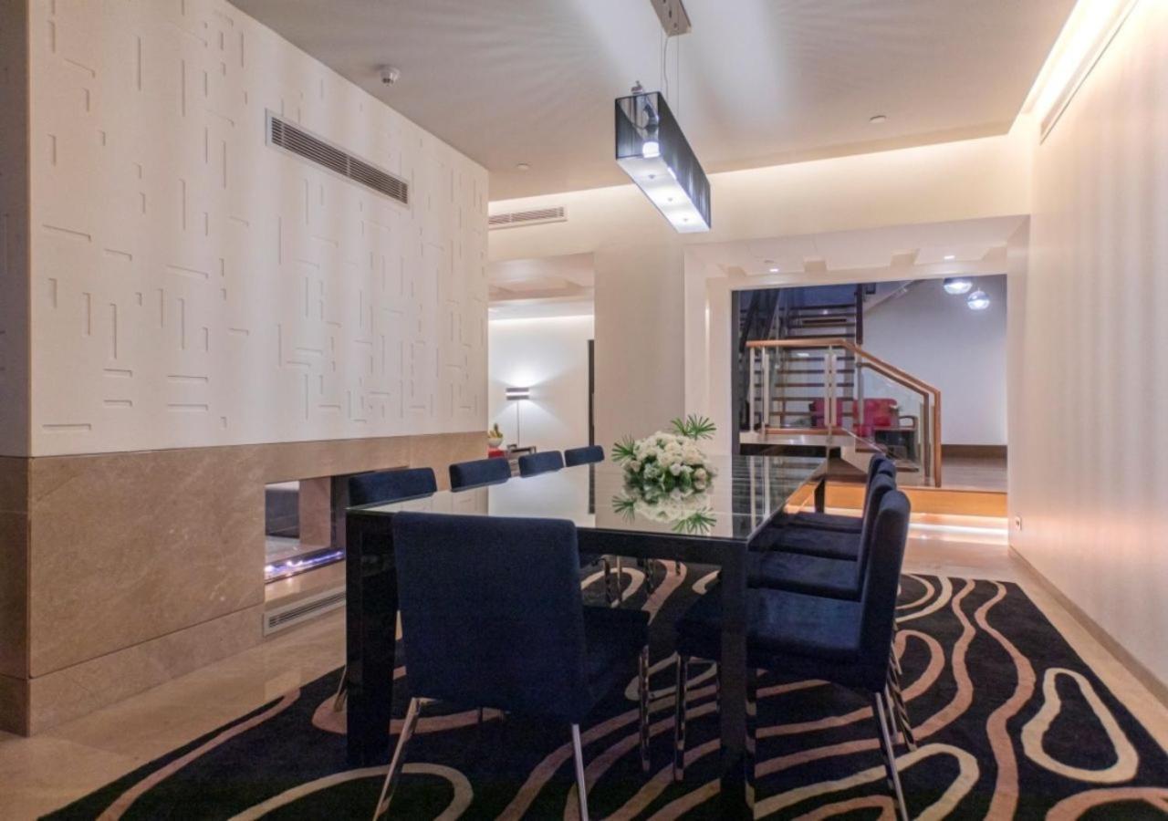 阿尔占罗塔纳酒店 安曼 外观 照片 A modern dining room